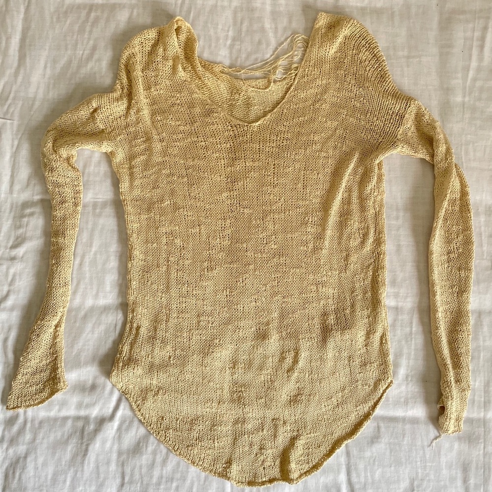 Helmut Lang silk sweater with shred detail.